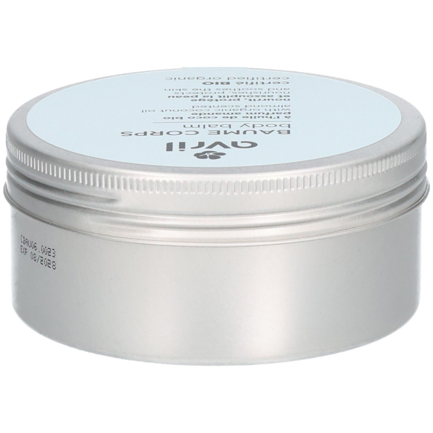 Pot argenté avec couvercle bleu clair. Inscription: Avril, Baume Corps, Body Balm. Certifié Bio. Sur le côté: date de péremption.