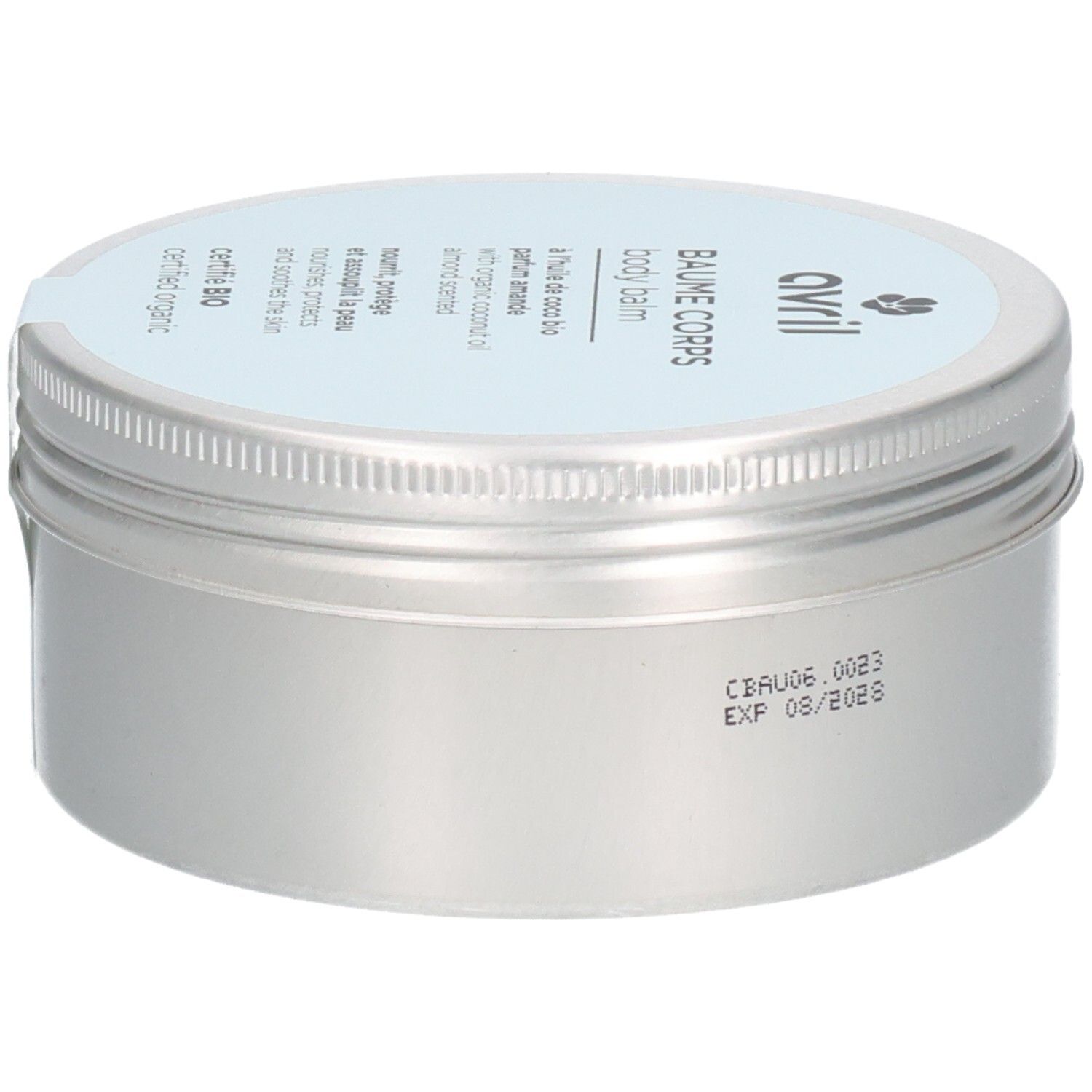 Pot argenté avec couvercle bleu clair. Inscription: Avril, Baume Corps, Body Balm. Certifié Bio. Sur le côté: date de péremption.