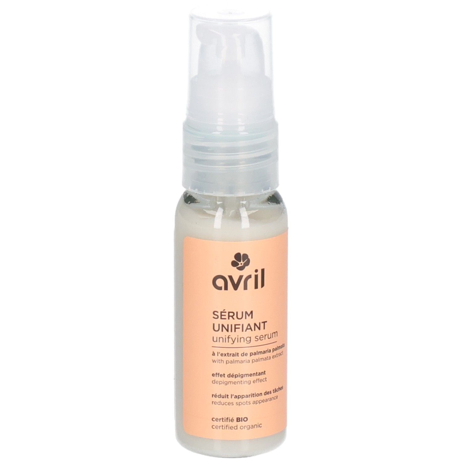 Flacon transparent avec pompe. Étiquette avec nom du produit, marque et certification. Contient du sérum. Certification bio.