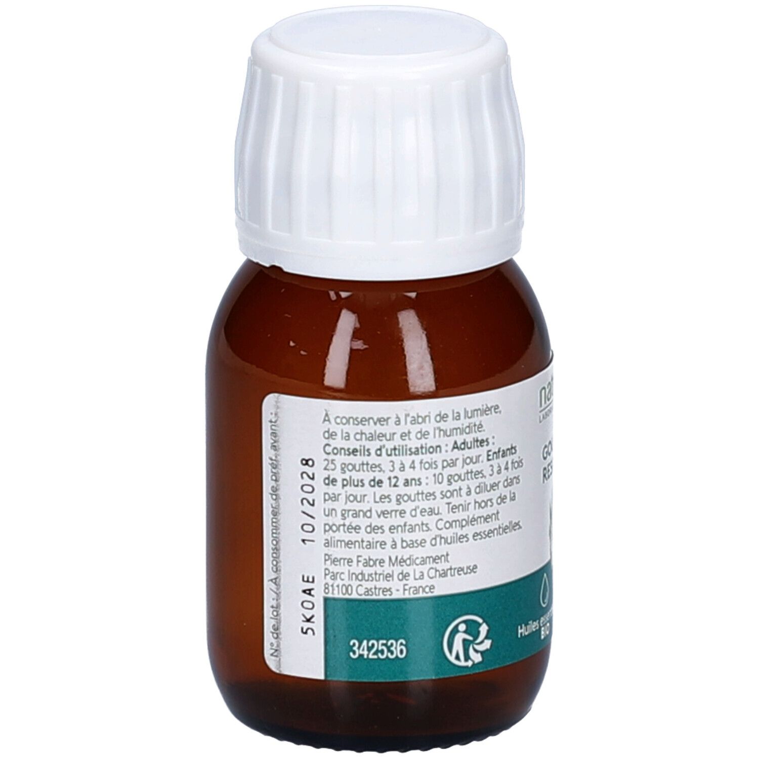 Flacon en verre brun avec bouchon blanc. Dos avec texte et date de péremption. Étiquette.