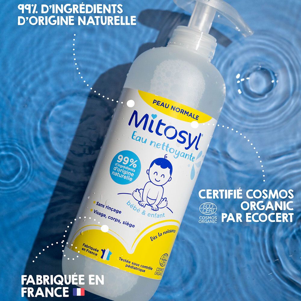 Flacon Mitosyl Eau nettoyante. Texte: 99% d'ingrédients d'origine naturelle. Certifié COSMOS ORGANIC. Illustration bébé.