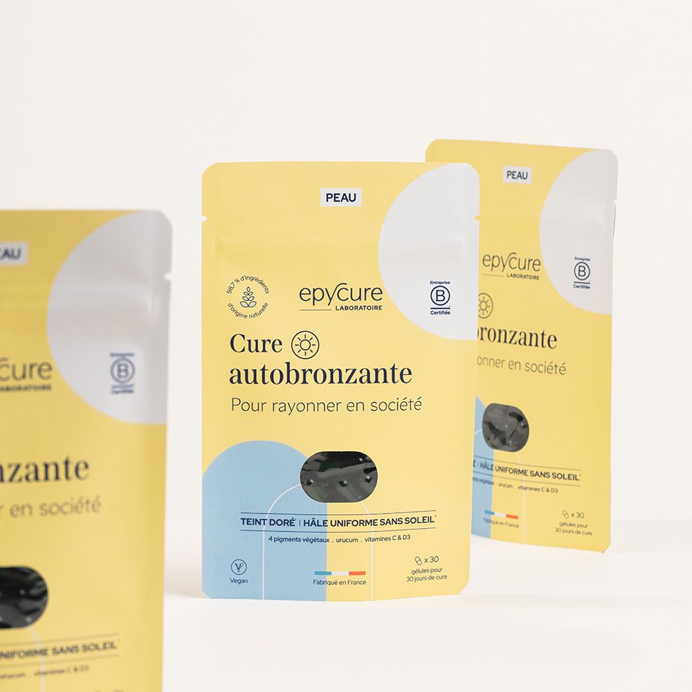 Plusieurs sachets jaunes avec Cure autobronzante. Inscription: Pour rayonner en société.