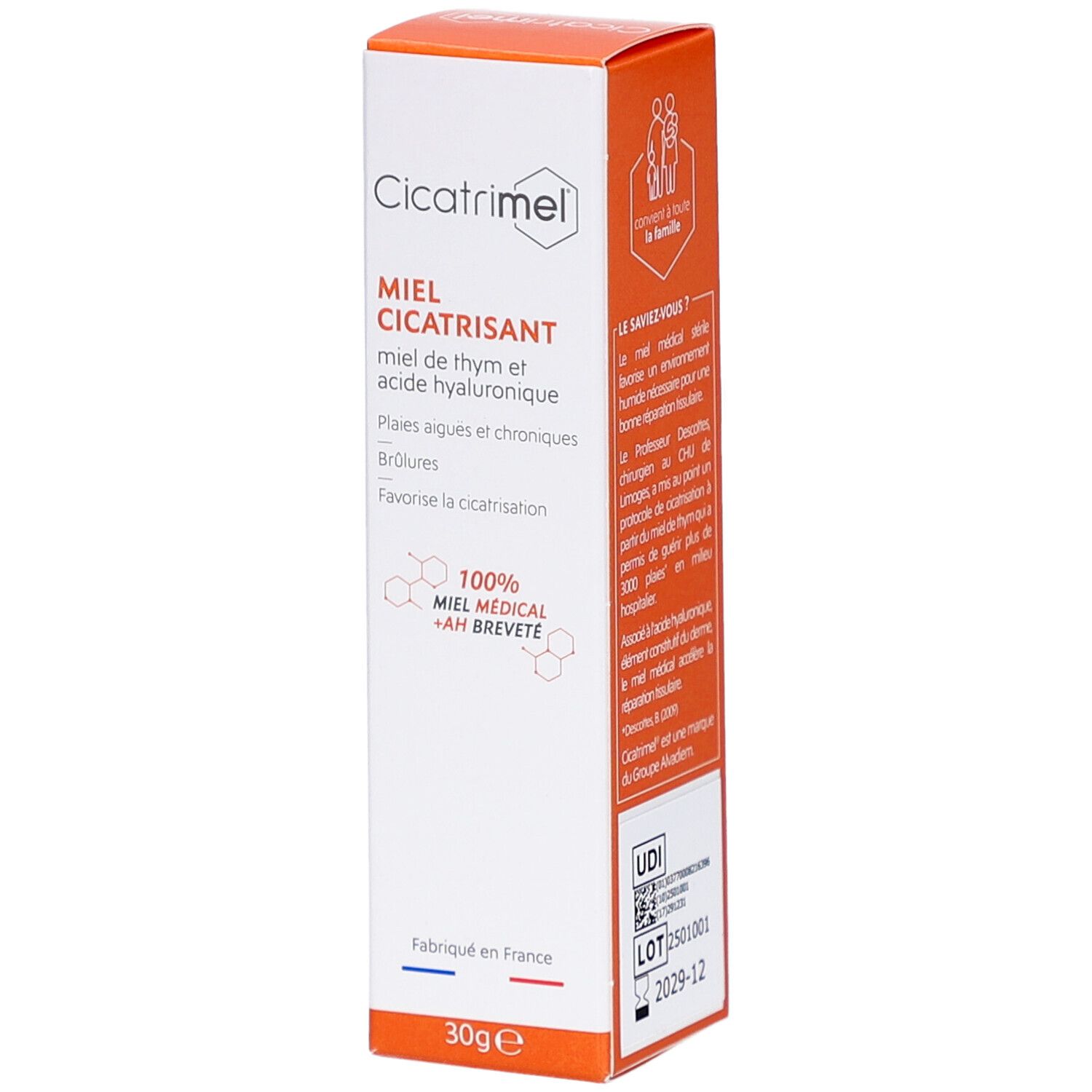 Emballage produit. Boîte blanche avec couvercle orange. Texte: Miel Cicatrisant, 30g. Logo et informations.