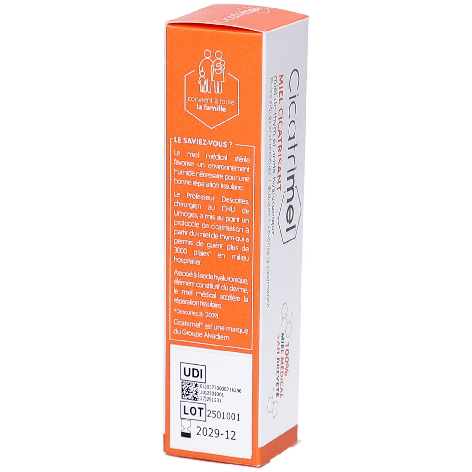 Emballage produit, dos. Texte: Miel Cicatrisant, informations, code UDI, numéro de lot, 30g. Couvercle orange.