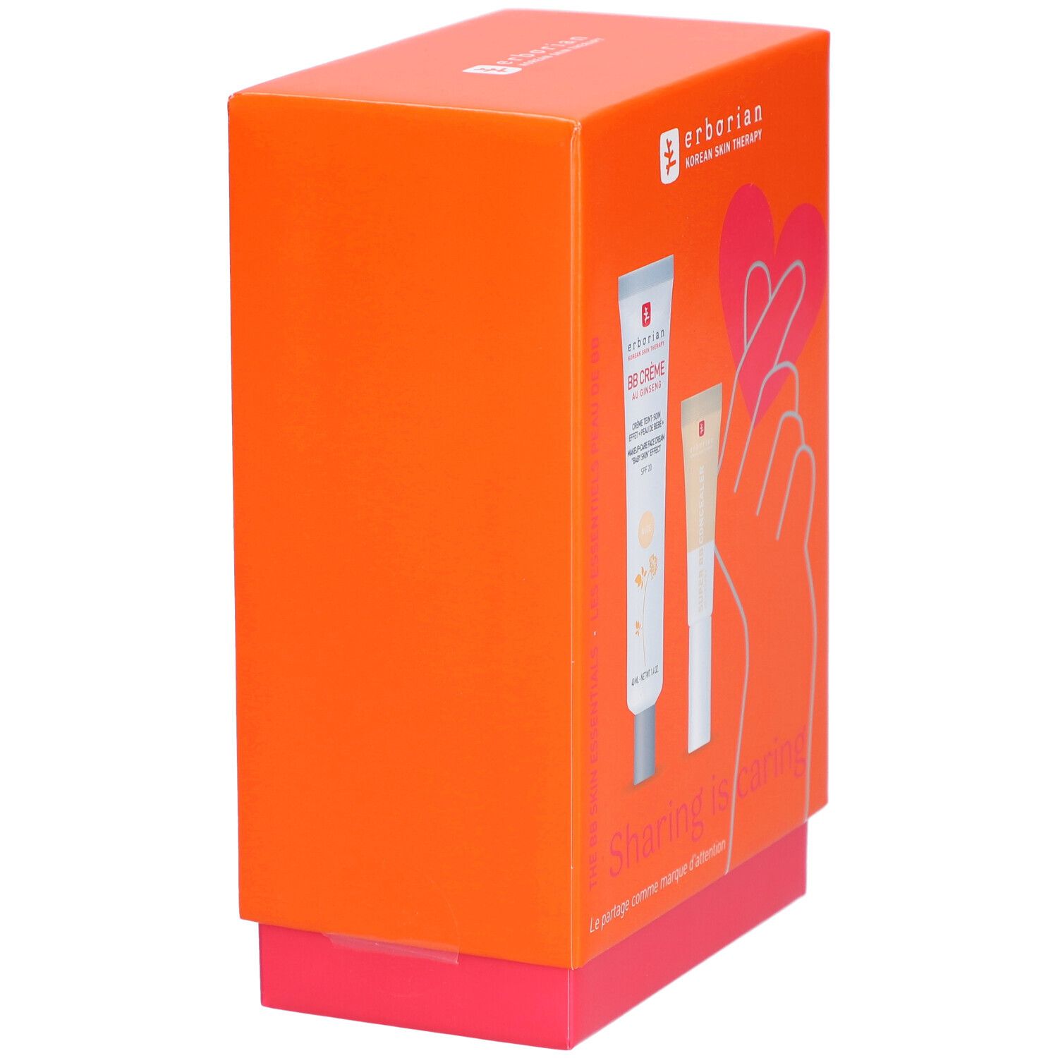 Coffret orange, vue oblique de côté. Inscription: BB Crème, Sharing is Caring. Marque: Erborian. Boîte avec base rouge.