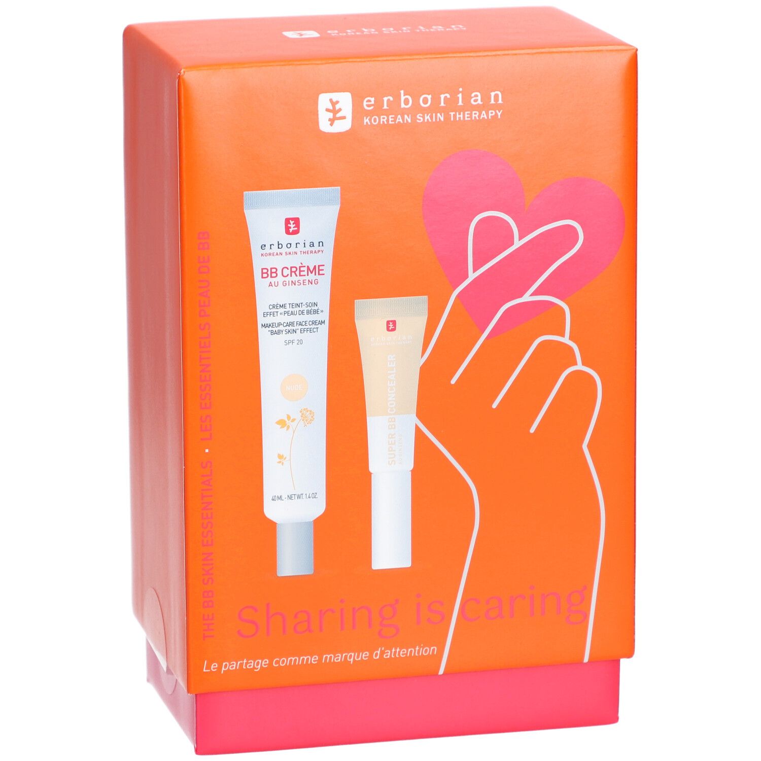 Coffret orange avec deux produits cosmétiques. Inscription: BB Crème, Sharing is Caring, main avec cœur. Marque: Erborian.