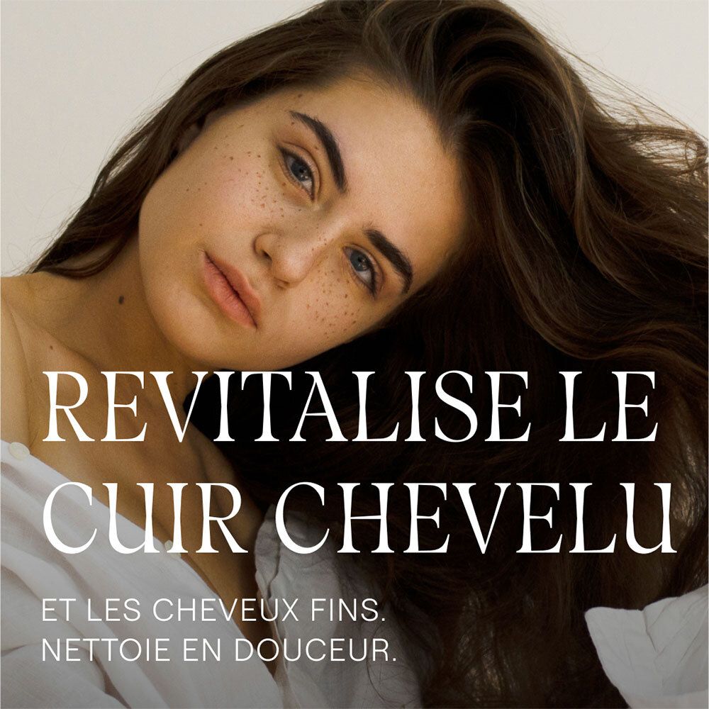 Femme aux longs cheveux bruns. Texte: Revitalise le cuir chevelu et les cheveux fins. Nettoie en douceur.