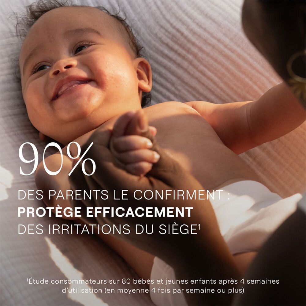 Bébé sur le dos. Texte: 90% des parents confirment: Protège efficacement des irritations du siège.