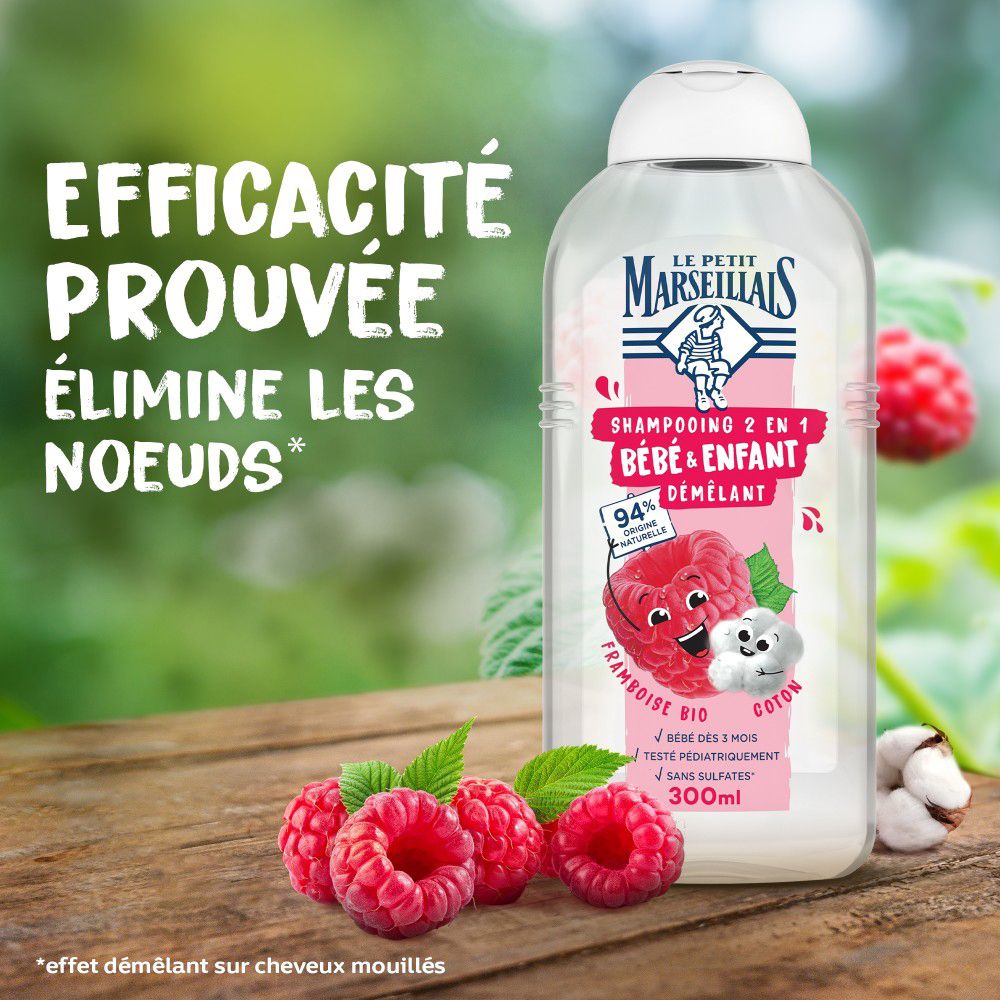 Flacon sur bois. Framboises et coton à côté. Texte: Efficacité Prouvée, Élimine les noeuds.
