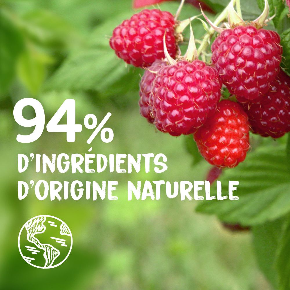 Gros plan sur des framboises. Texte: 94% d'ingrédients d'origine naturelle.