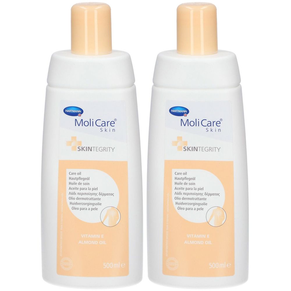 Deux flacons d'huile de soin MoliCare Skin. Flacons blancs avec bouchon beige. Inscription : Care oil, Vitamin E, Allantoin Oil.