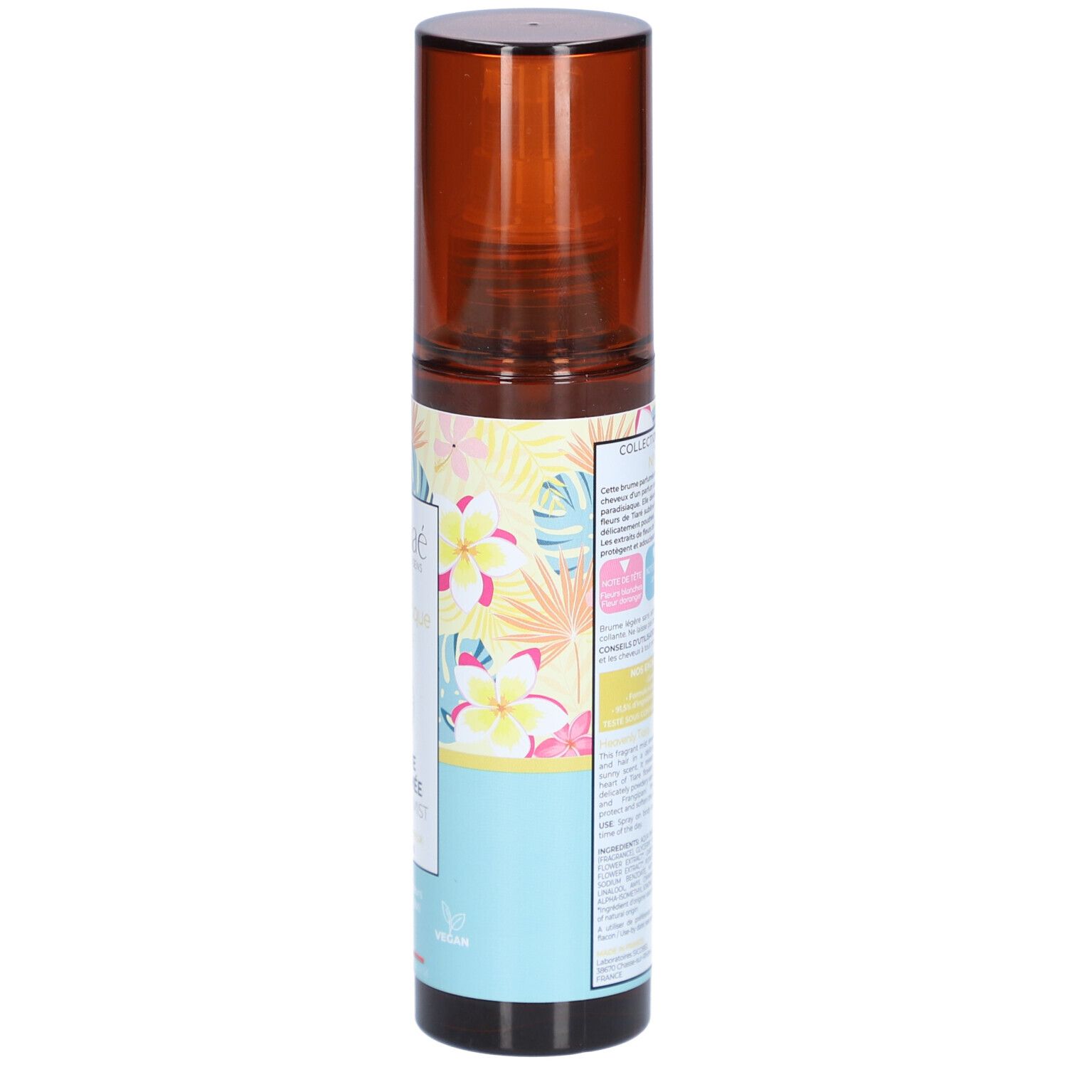 Flacon spray marron, vue latérale. Étiquette avec texte et motif floral. Texte: OSMAE, Brume Parfumée, Scented Mist.
