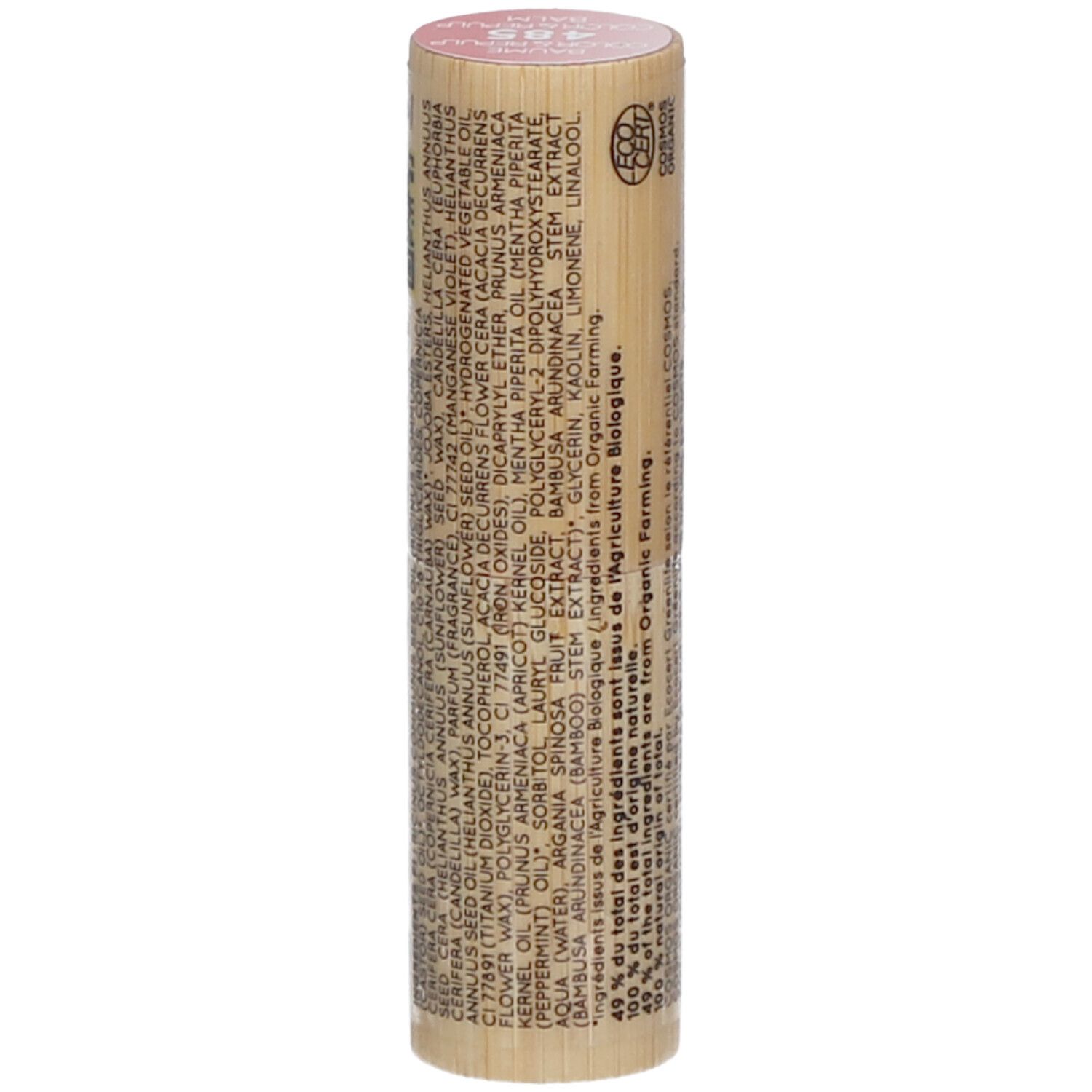 Tube de baume à lèvres cylindrique en bois. Rose en haut, avec des inscriptions. Visible : ingrédients, COSMOS ORGANIC.