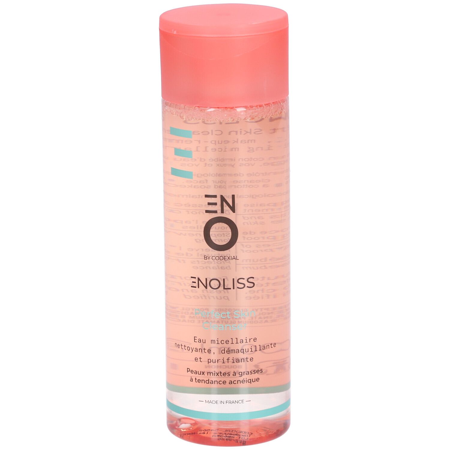 Flacon cylindrique rose. Inscription: ENOLISS, Perfect Skin Cleanser. Étiquette du produit visible.