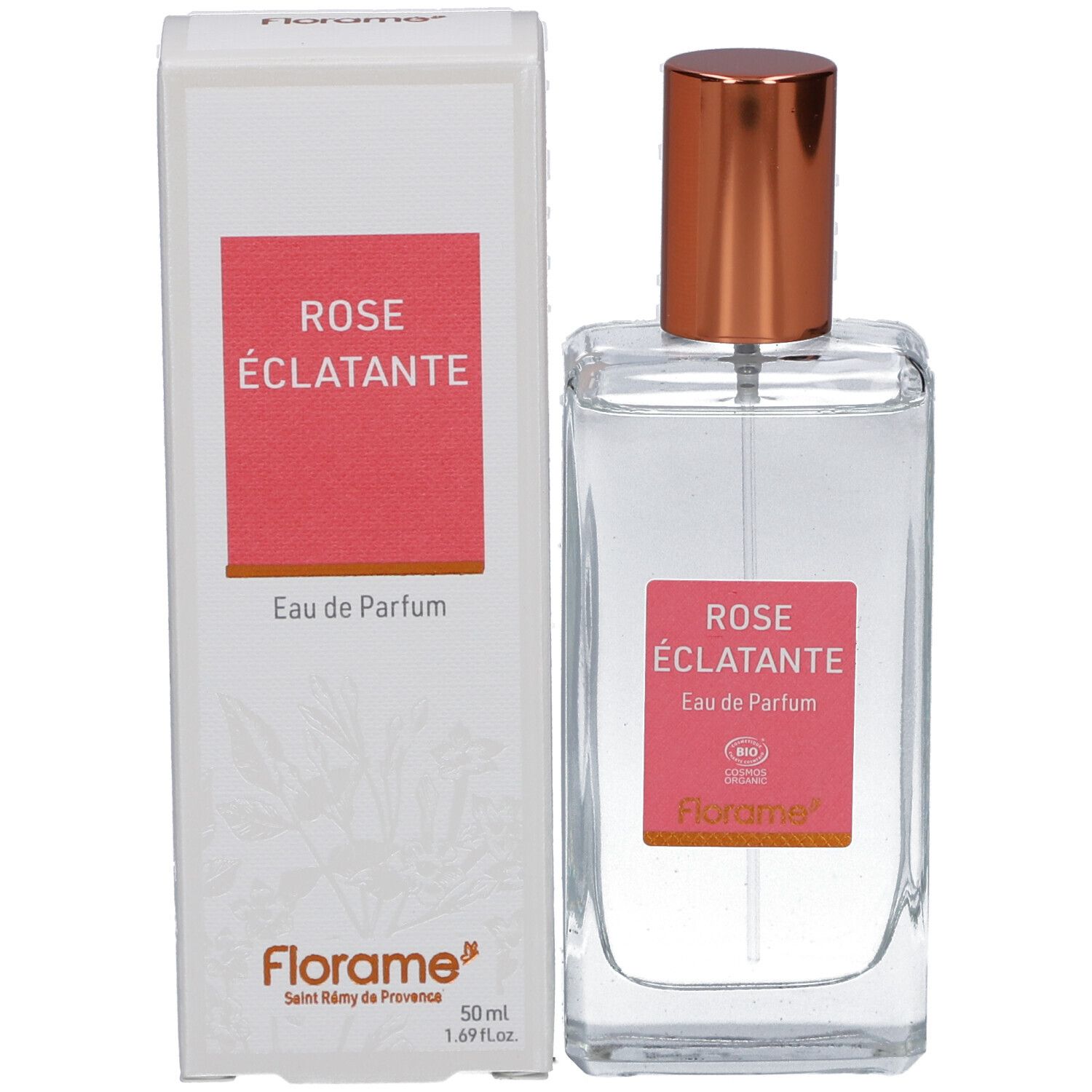 Flacon et emballage. Flacon avec bouchon cuivré et étiquette rose. Emballage blanc avec texte.