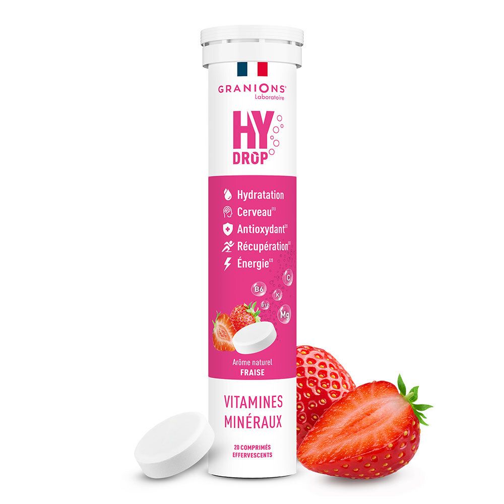 Tube de comprimés effervescents. Inscription HYDROP, saveur fraise, vitamines, minéraux. Fraises et comprimé à côté.