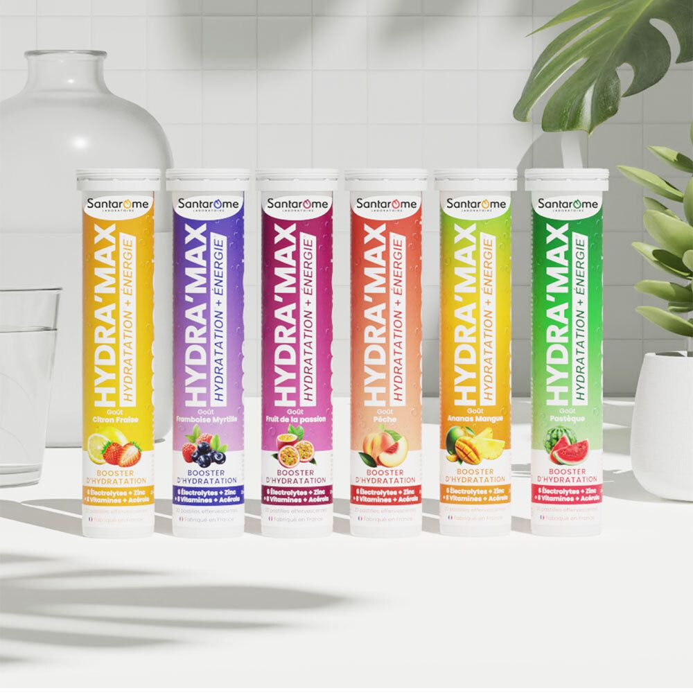 Rangée de six tubes Santarome Hydra'Max. Différentes saveurs avec étiquettes colorées.