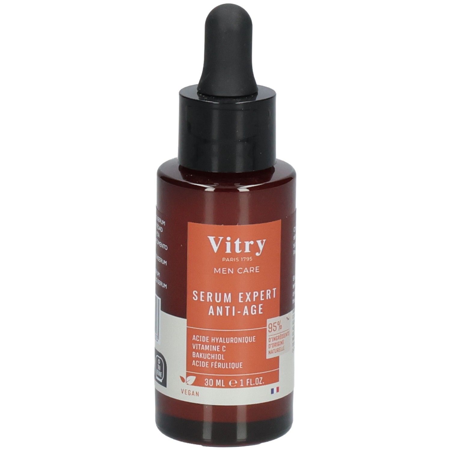 Flacon brun avec bouchon noir et pipette. Étiquette avec nom du produit et ingrédients. Logo végan.