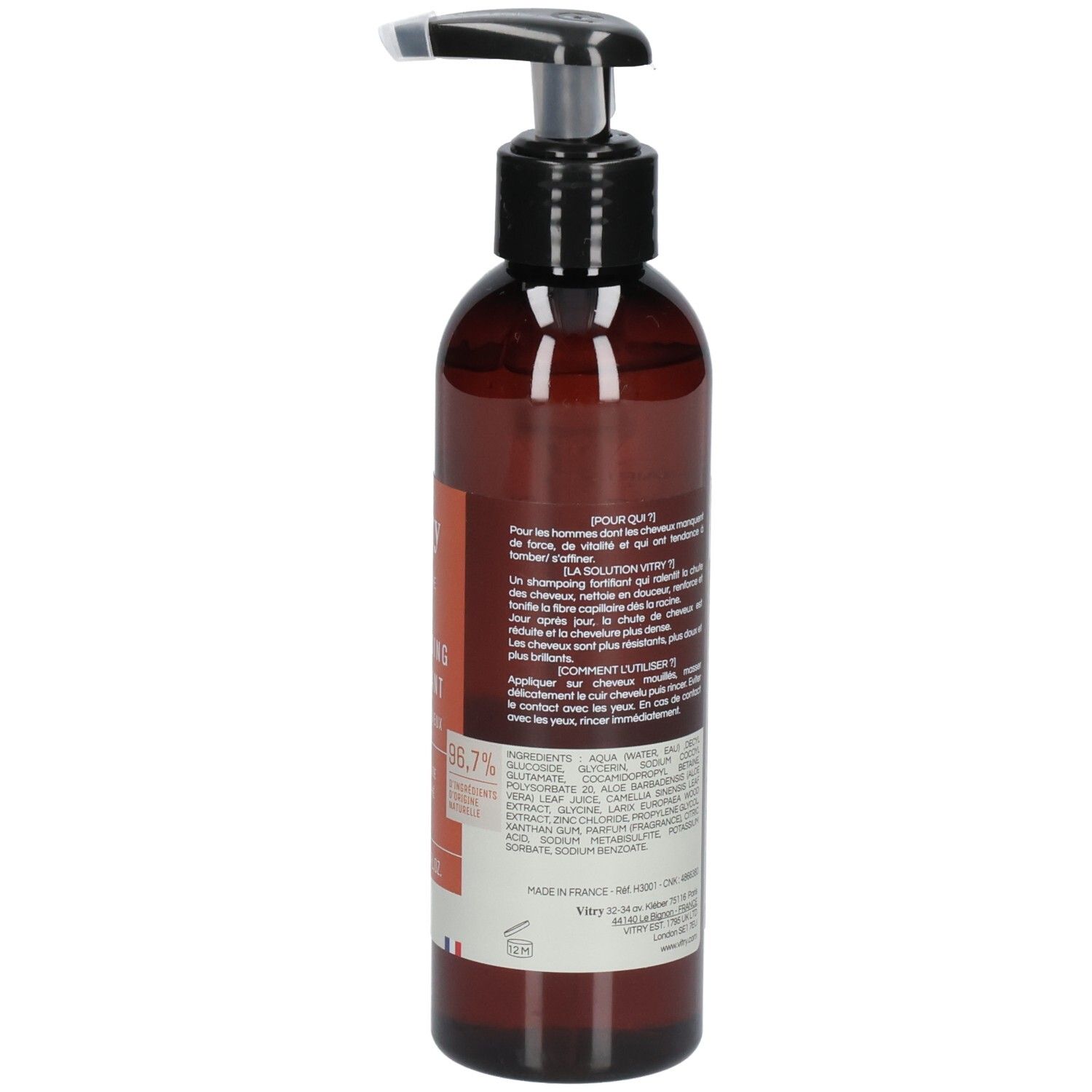 Flacon brun avec pompe noire. Dos avec texte. Vegan.