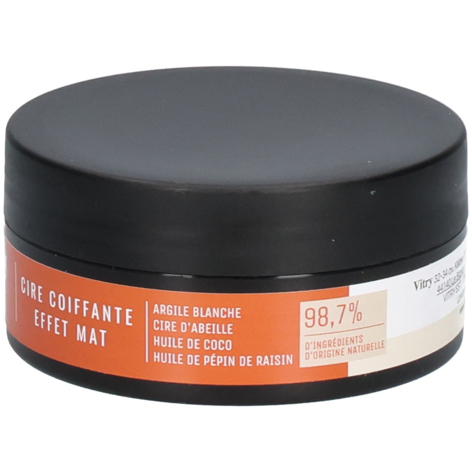 Pot noir avec étiquette orange. Texte : "CIRE COIFFANTE EFFET MAT". Imprimé : ingrédients, 98,7% ingrédients d'origine naturelle.