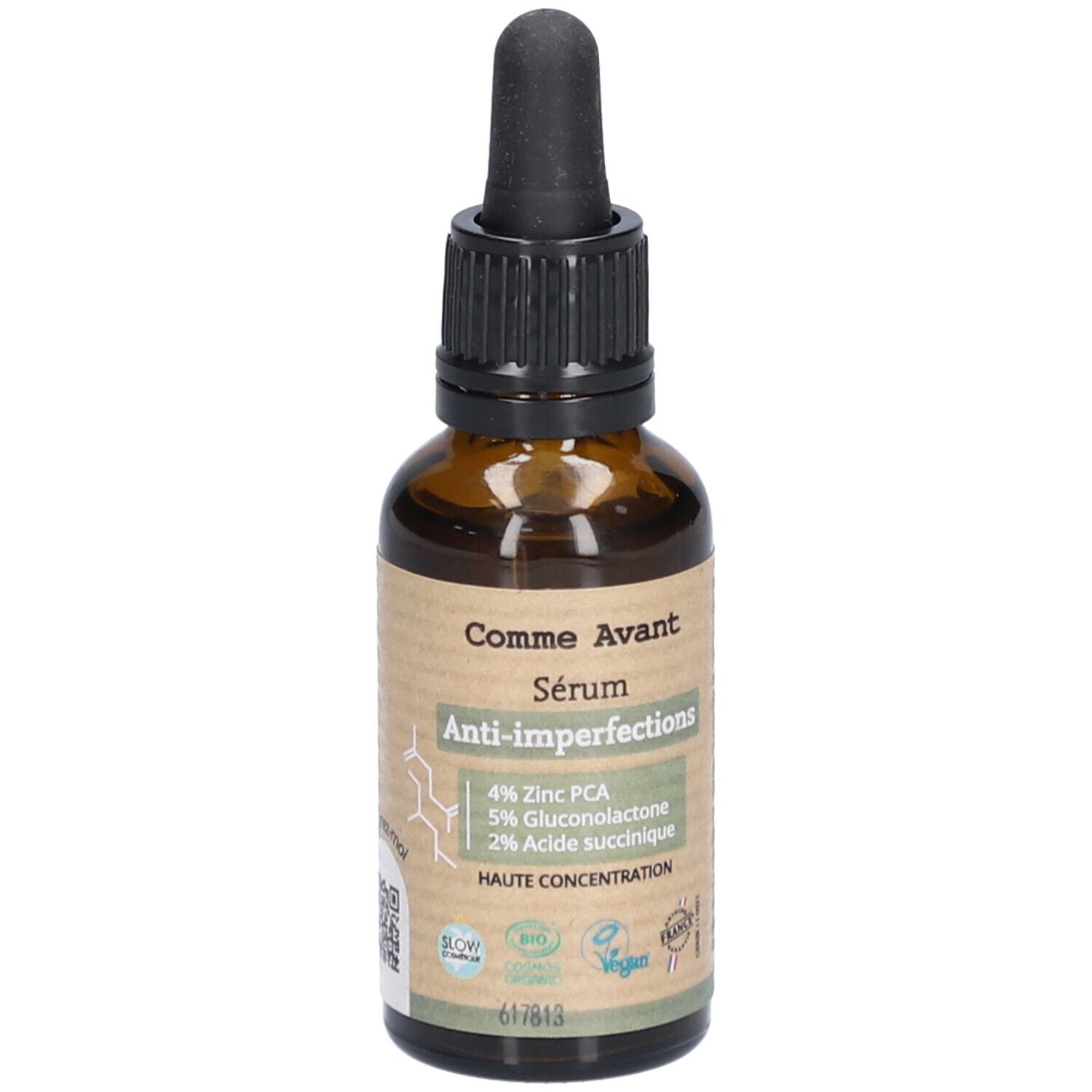 Flacon en verre brun avec compte-gouttes noir. Étiquette avec nom du produit et ingrédients: 4% Zinc PCA, 5% Gluconolactone, 2% Acide succinique.