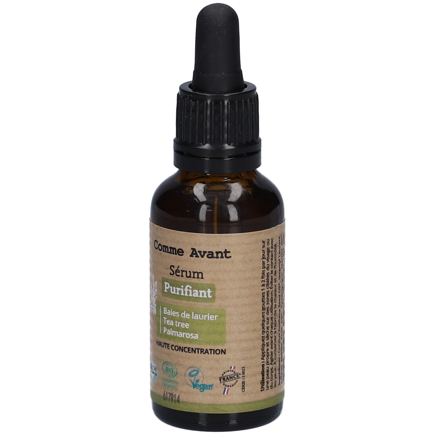 Flacon en verre brun avec bouchon noir et pipette. Étiquette avec nom du produit et ingrédients. Label vegan.