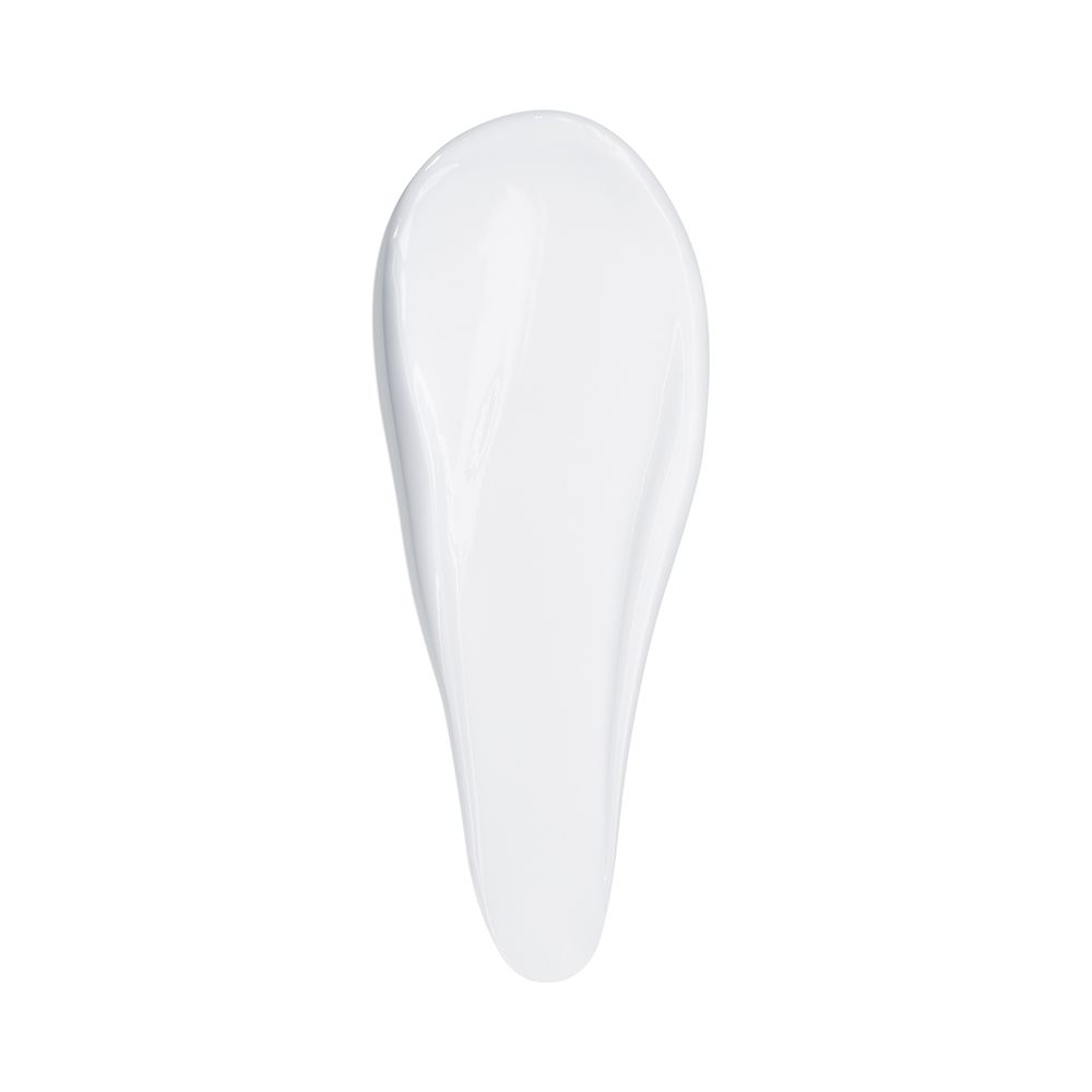 Une texture de crème blanche sur fond blanc.