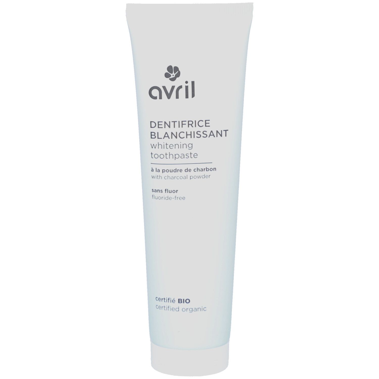 Tube de dentifrice blanc. Inscriptions: Avril, Dentifrice Blanchissant, whitening toothpaste, à la poudre de charbon, certifié BIO.