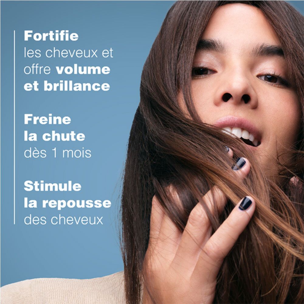 Femme avec des cheveux. Texte: Fortifie, offre volume et brillance, freine la chute, stimule la repousse.