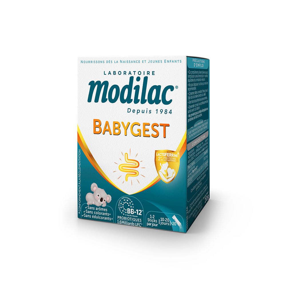 Boîte Modilac Babygest. Boîte blanche avec accents bleus et orange. Contient des probiotiques BB-12. Texte : Babygest, Laboratoire Modilac.