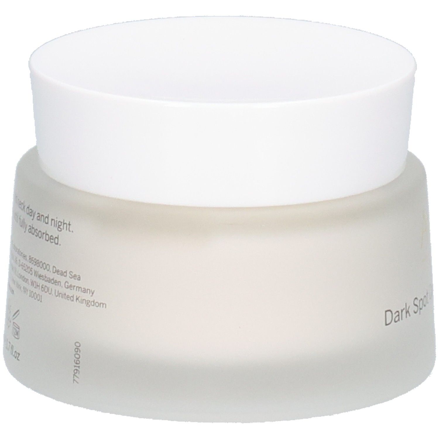 Pot de crème avec couvercle blanc. Inscription AHAVA et Dark Spot Correcting Gel Cream. Texte au dos.