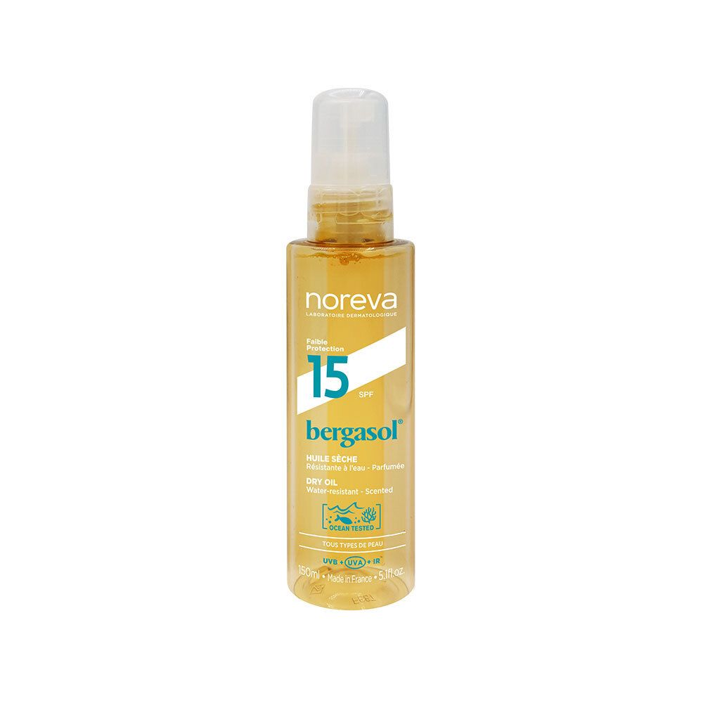 Flacon jaune avec vaporisateur. Inscriptions: Noreva, SPF 15, bergasol. Huile sèche. Résistant à l'eau. Avec certifications.