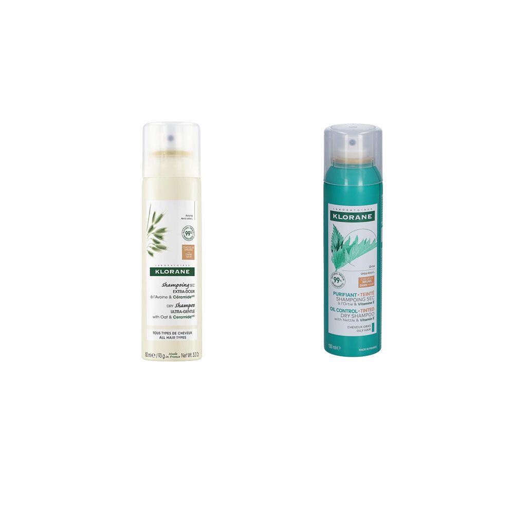 Deux flacons de spray. À gauche : Klorane shampooing sec à l'ortie. À droite : Klorane shampooing sec à la vitamine E. Les deux avec tête de pulvérisation.