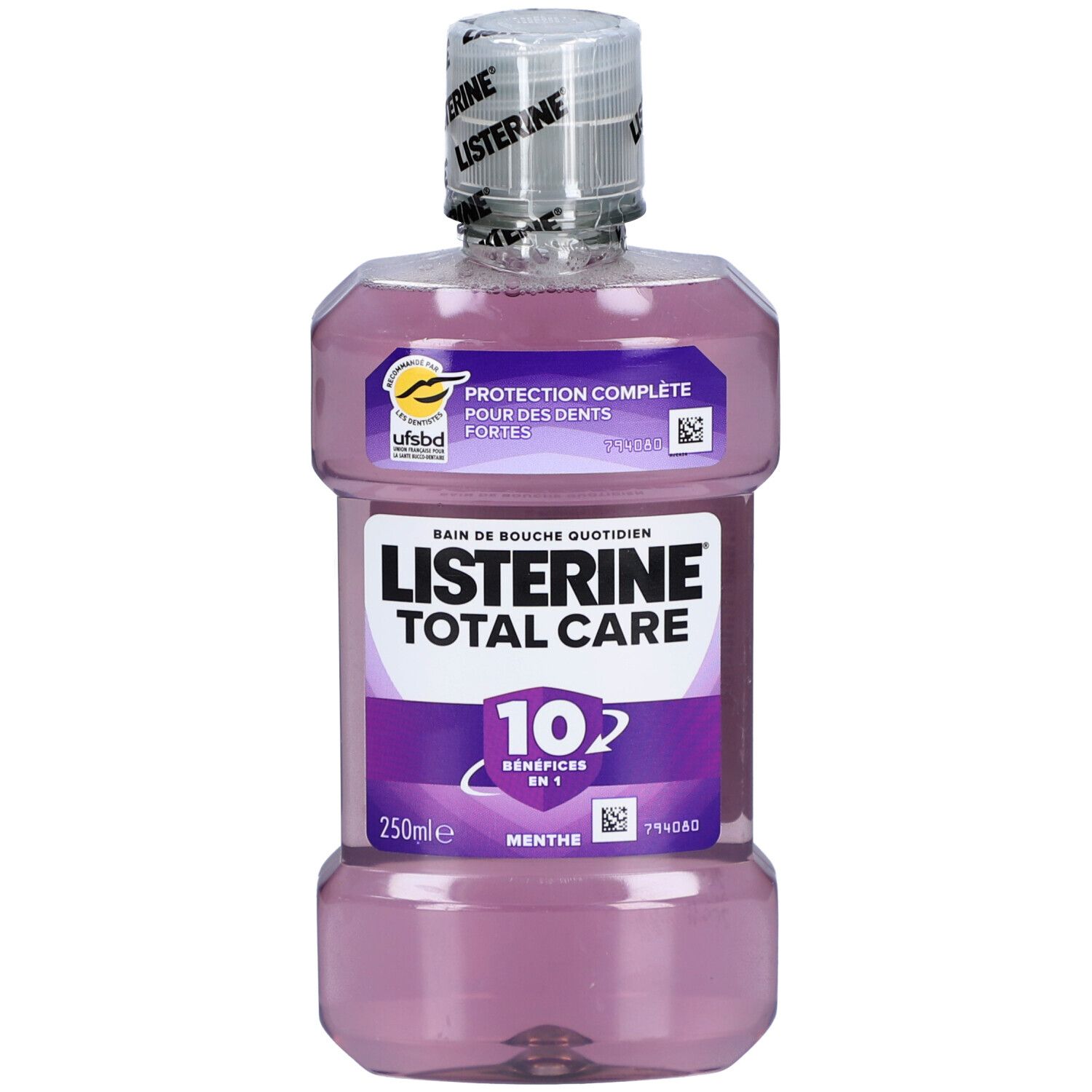 Bain de bouche Listerine Total Care. Flacon avec étiquette. Texte : Protection complète pour des dents fortes. 250ml.