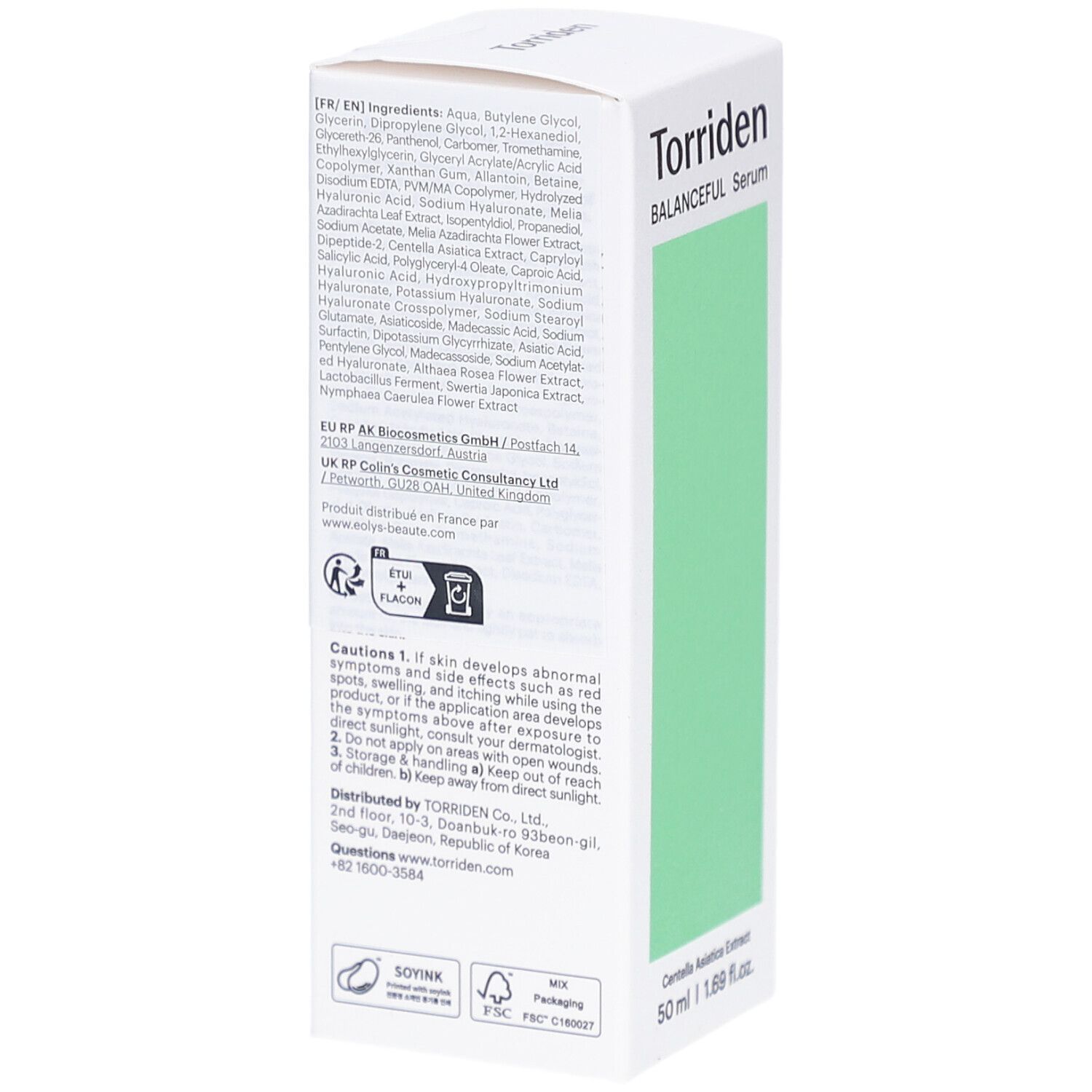 Boîte blanche avec texte. Ingrédients, avertissements et informations fabricant. Logos de durabilité.