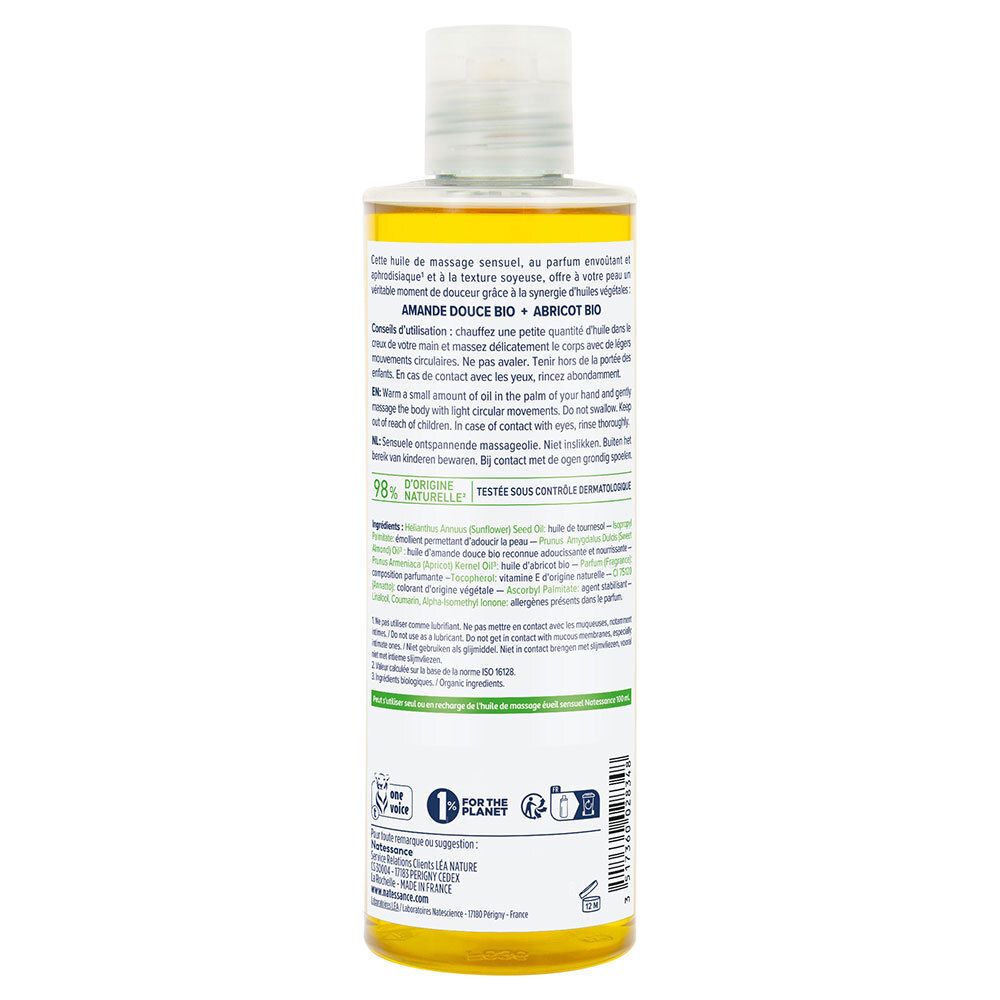 Dos du flacon d'huile de massage. Texte: Huile d'amande douce, huile de noyau d'abricot. Ingrédients naturels à 98%.