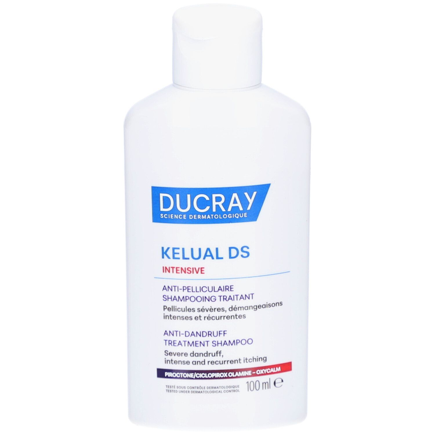 Flacon blanc avec étiquette bleue. Inscription: DUCRAY, KELUAL DS INTENSIVE. Shampooing antipelliculaire.