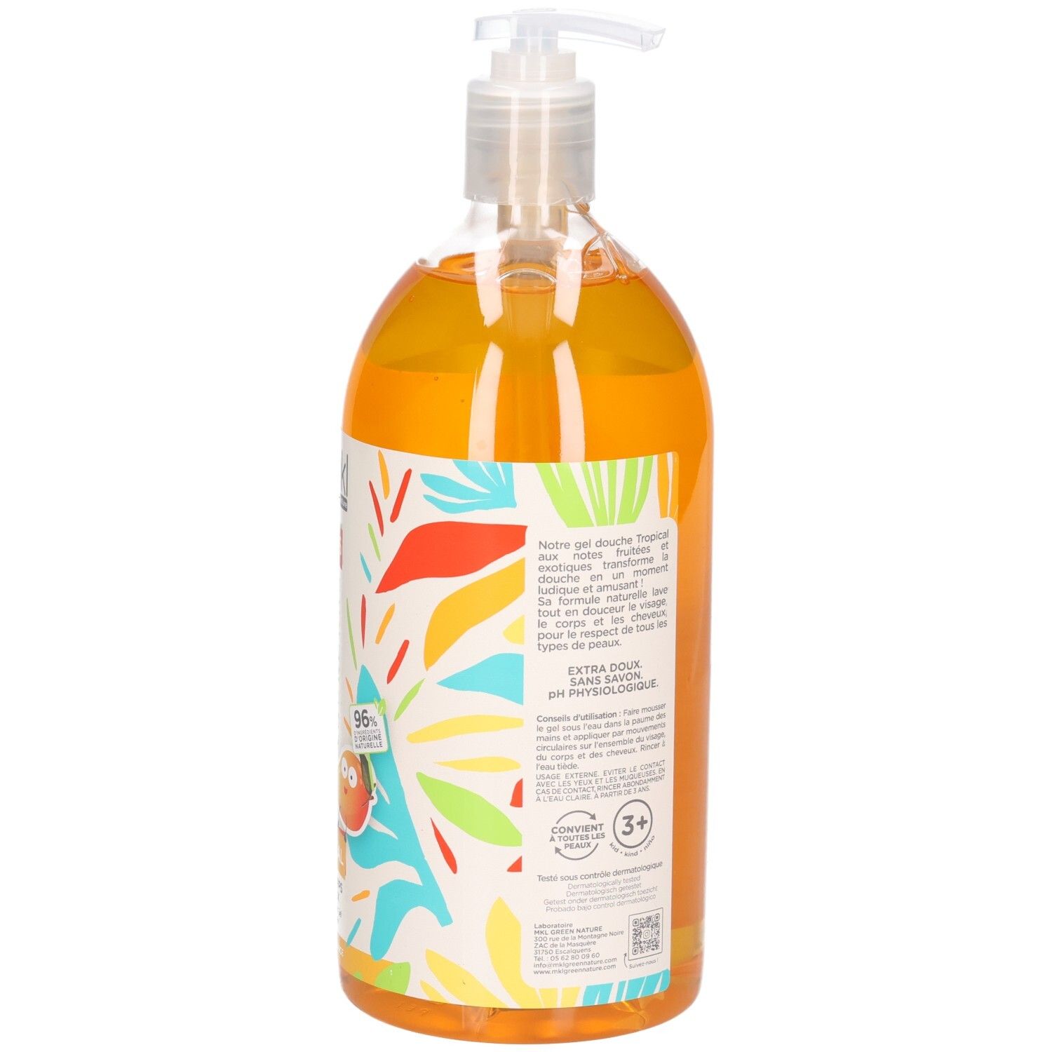 Gel douche orange dans une bouteille transparente avec distributeur à pompe et décoration de feuilles colorées.