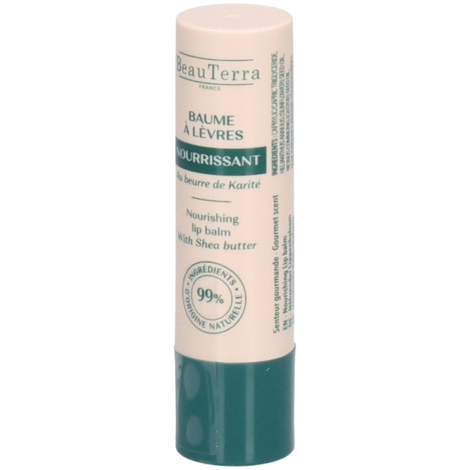 Bâton de baume à lèvres. Étui beige et vert. Inscription: BeauTerra, Baume à Lèvres Nourrissant, 99% d'ingrédients d'origine naturelle.