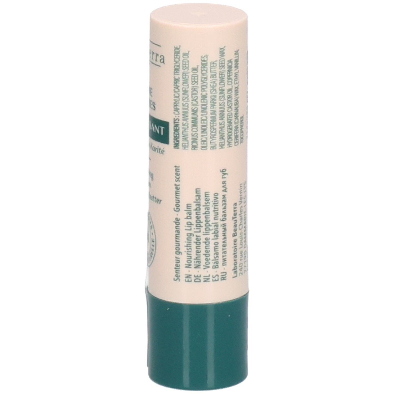 Bâton de baume à lèvres. Étui beige et vert. Inscription: Ingrédients, parfum. Texte en plusieurs langues.