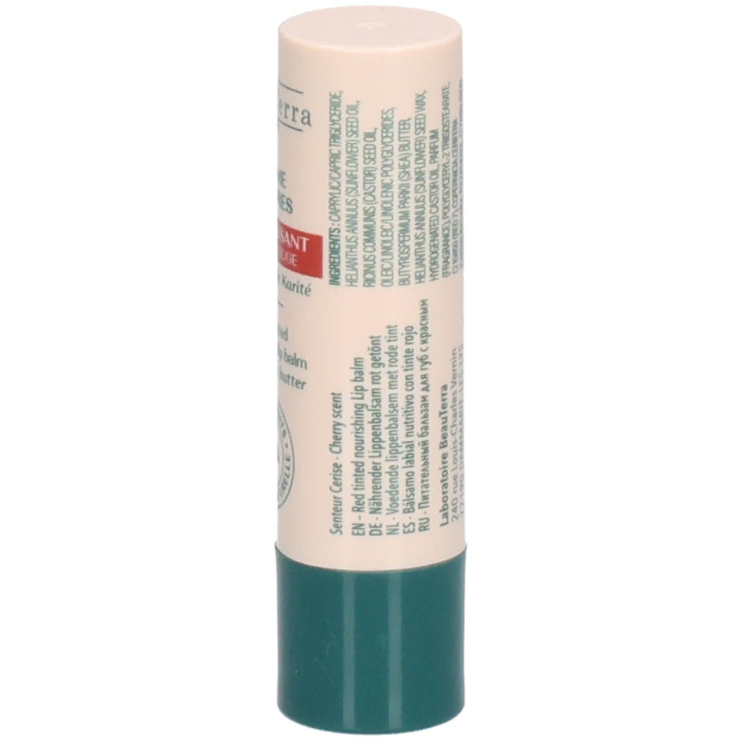 Bâton de baume à lèvres. Étui beige et vert. Liste des ingrédients et informations. Inscription: Sensur Cerise. Parfum cerise. Informations multilingues.