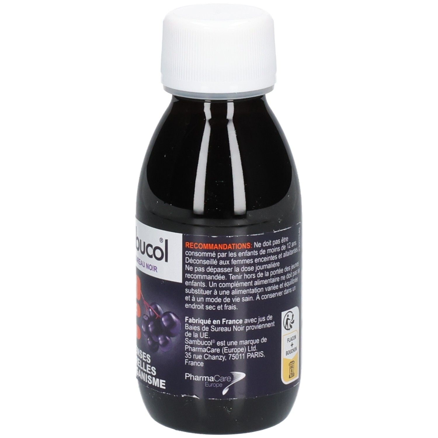 Bouteille de complément alimentaire liquide. Inscriptions: Sambucol, recommandations, fabriqué en France.