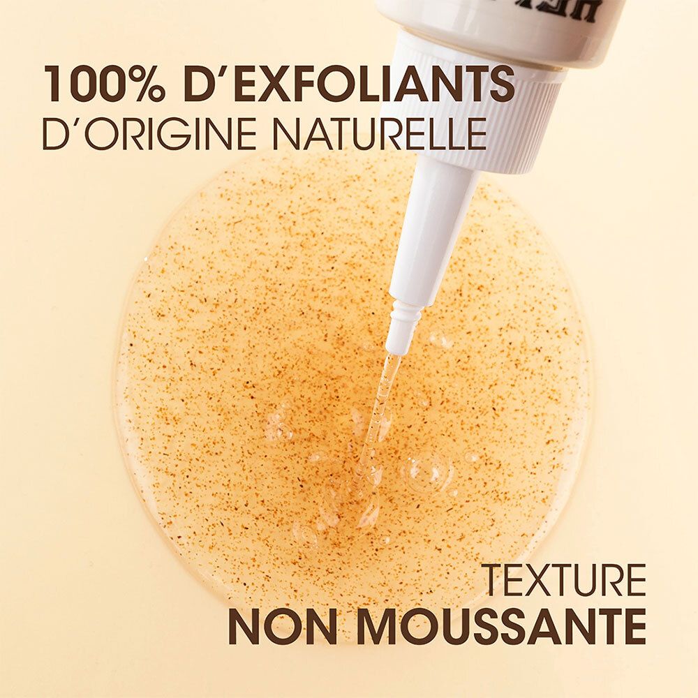 Flacon avec applicateur. Gel qui coule. Texte: 100% exfoliants naturels, non moussant.