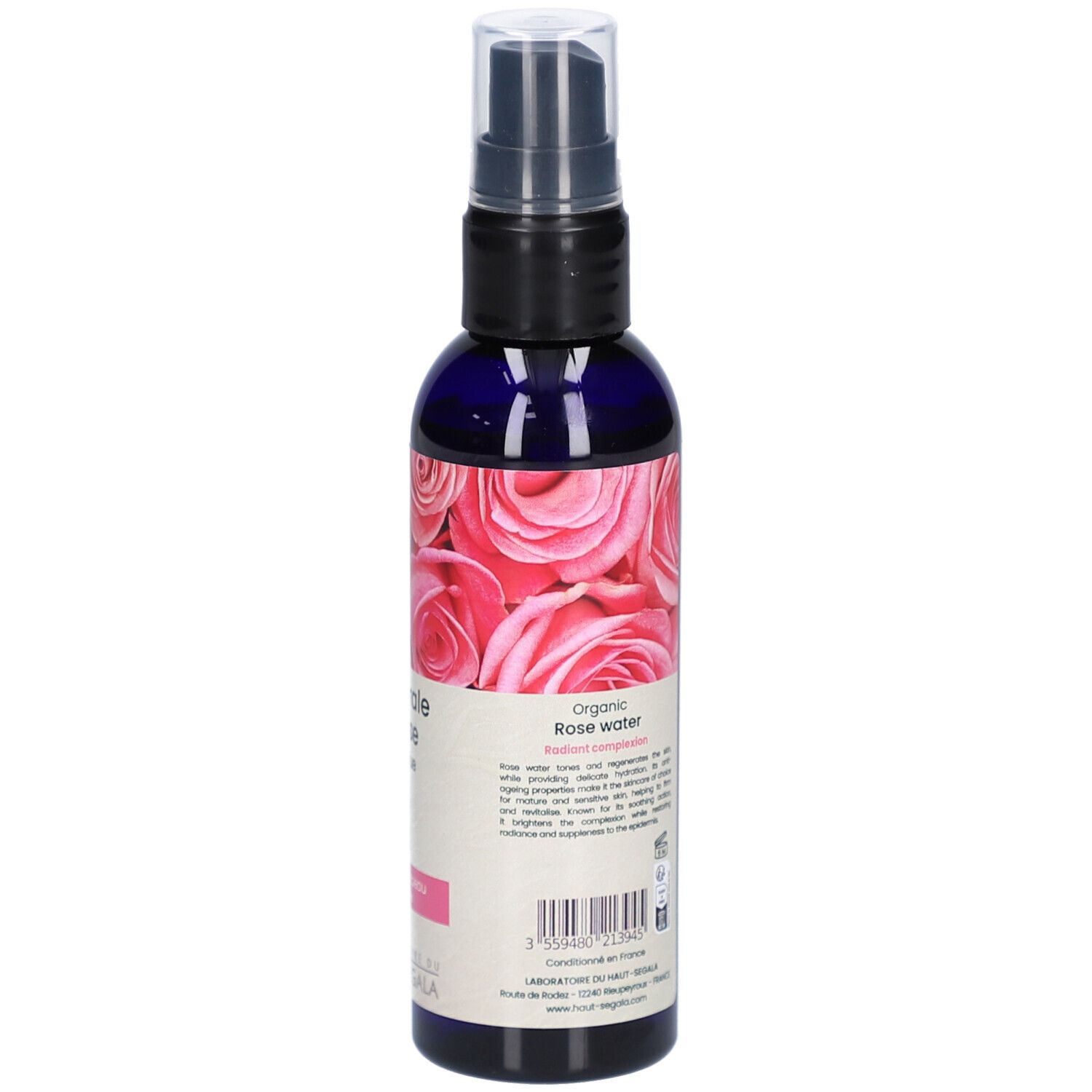 Vue arrière du flacon. Étiquette avec texte et ingrédients. Motif de roses. Certification bio. Nom du produit: Eau florale de rose biologique.