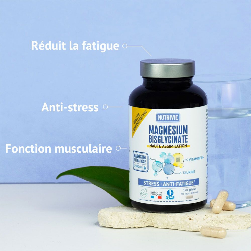 NUTRIVIE Magnesium Bisglycinate flacon avec gélules, à côté d'une feuille verte et un verre d'eau.