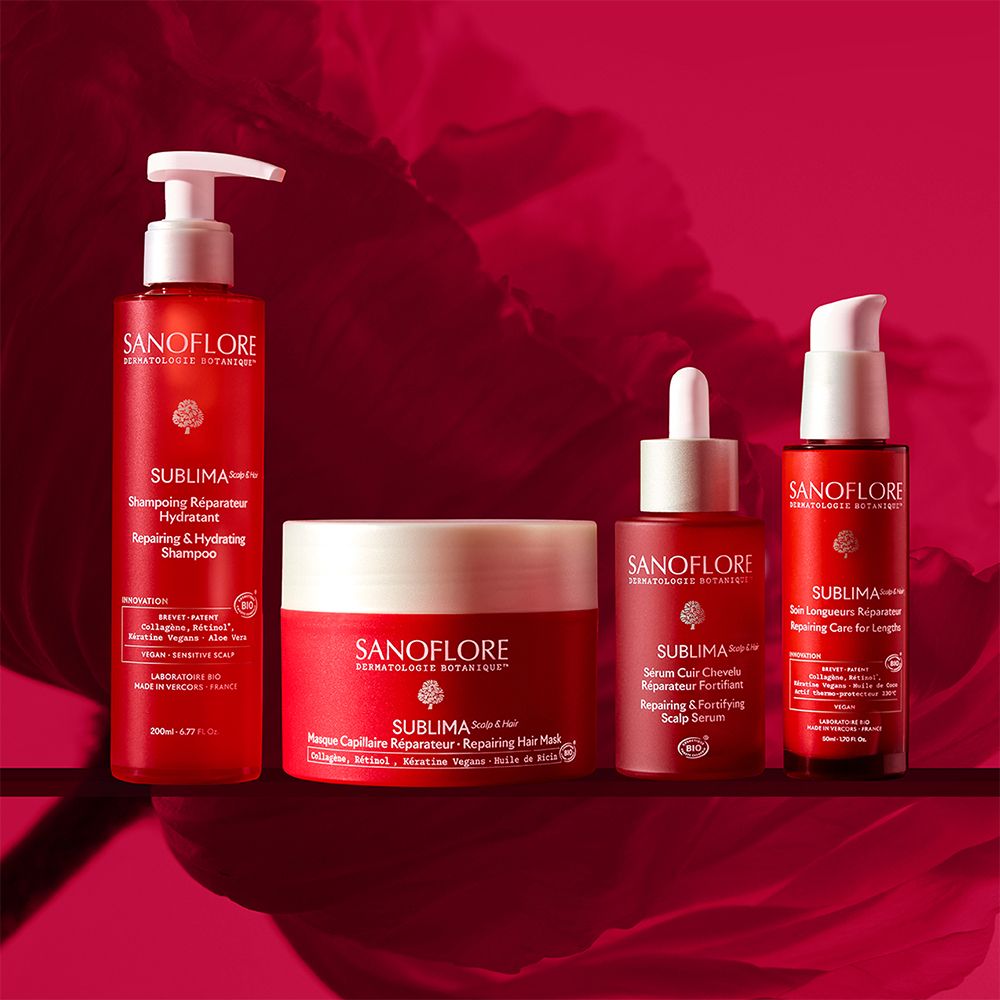 Quatre flacons rouges. Produits: Shampoing, Masque, Sérum, Soin. Texte: SANOFLORE, Sublima.