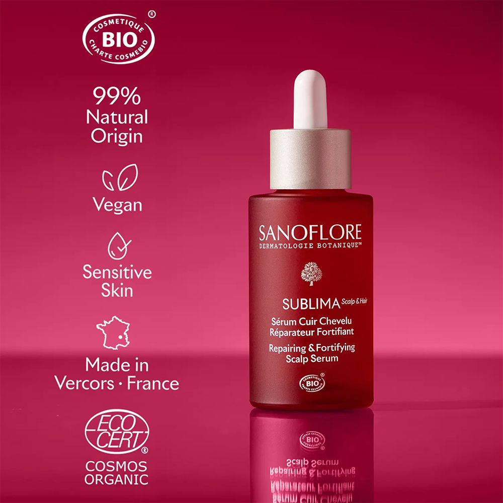Flacon rouge, bouchon blanc. Texte: SANOFLORE, SUBLIMA, Sérum Cuir Chevelu, Réparateur Fortifiant. Bio.