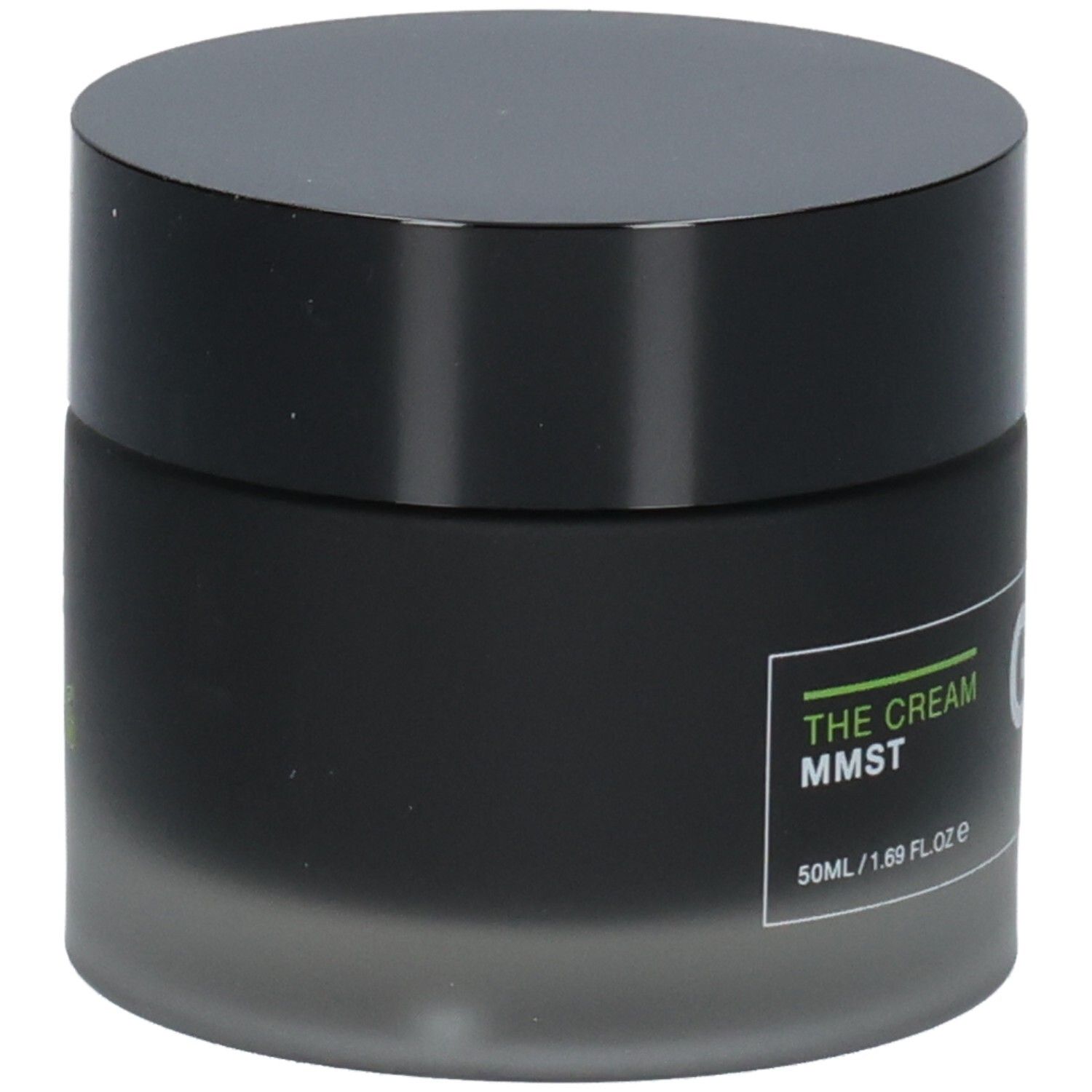 Pot noir avec couvercle noir. Inscription THE CREAM MMST. 50ml/1.69 Fl.oz e.