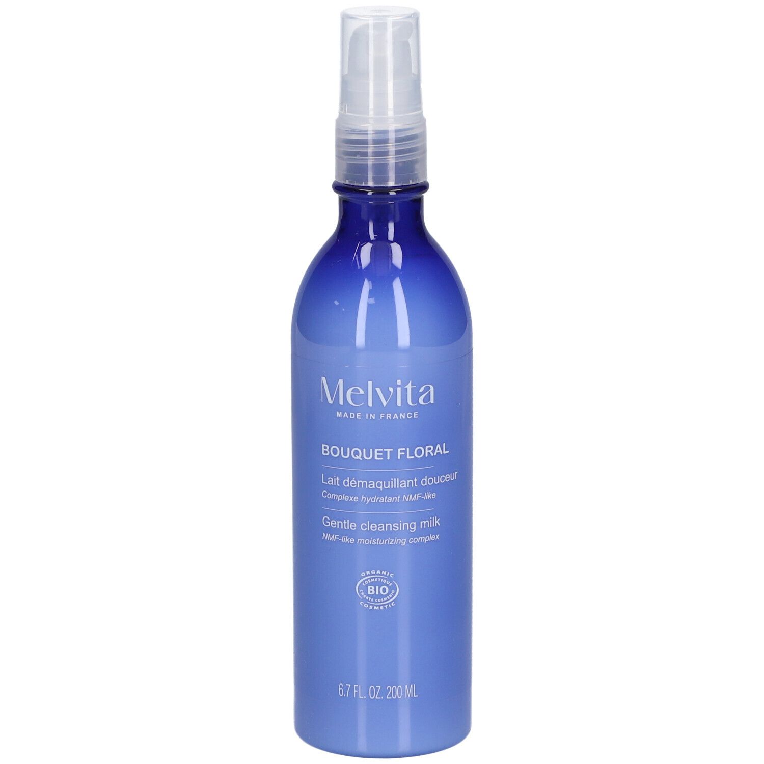 Flacon bleu transparent avec vaporisateur. Inscription: MELVITA, Bouquet Floral, Gentle cleansing milk, label BIO.