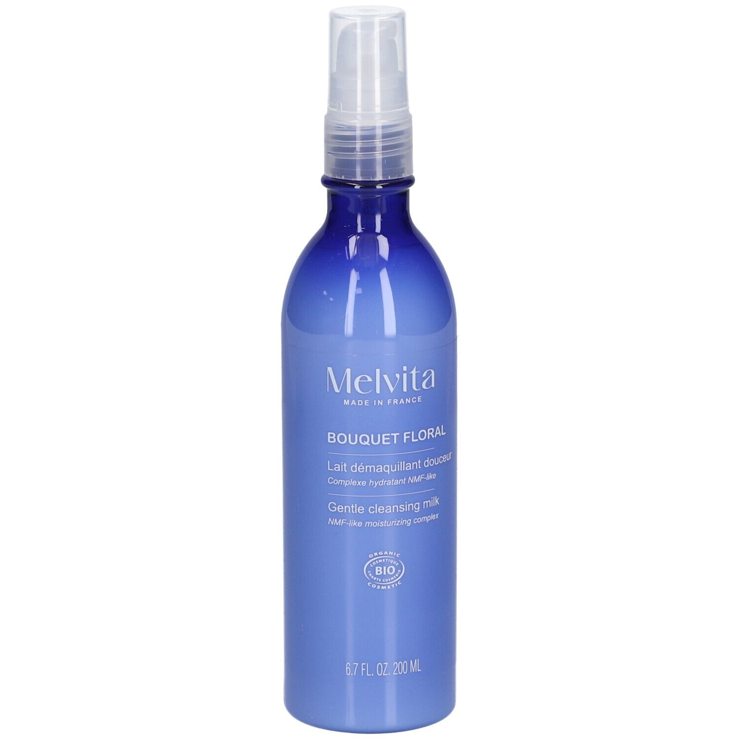 Flacon bleu transparent avec vaporisateur. Inscription: MELVITA, Bouquet Floral, Gentle cleansing milk, label BIO.